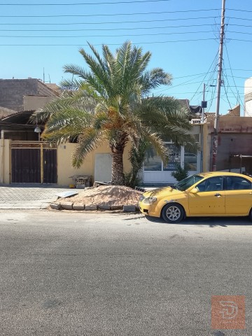 بيت تجاري مساحة 200 متر في كربلاء للبيع
