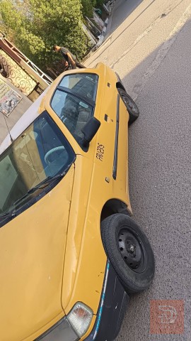 بيجو رواى 9 نظيفة مصفرة للبيع في بغداد