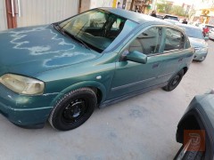 اوبل استرا 2002 بغداد للبيع