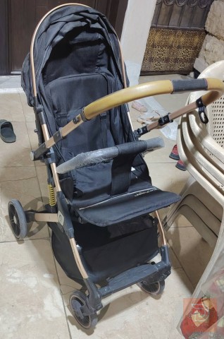 عربة أطفال للبيع في بغداد