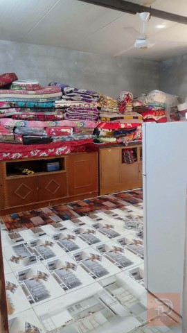 بيت مع محل في حي الحكيم 200 متر للبيع في بغداد