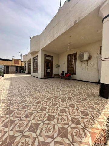 أرض مع بيتين 3000 متر للبيع في البصرة