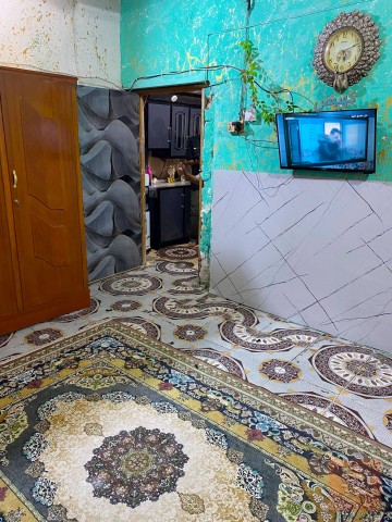 بيت تجاوز غرفتين وصالة في حي الشهداء للبيع في بغداد