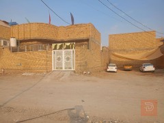 دار سكن وقطعة أرض جديد للبيع في ذي قار