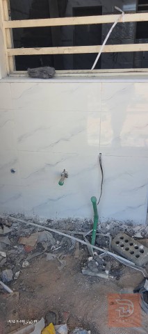 كادر كامل خلفه السراميك والبورسلين — عموم العراق