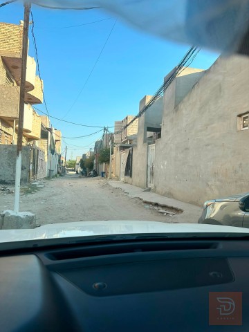قطعة ارض 100 متر في كربلاء شارع بغداد للبيع