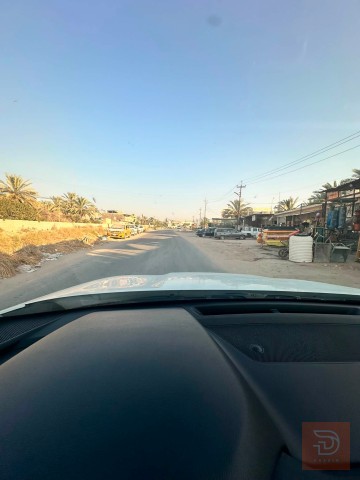 قطعة ارض 100 متر في كربلاء شارع بغداد للبيع