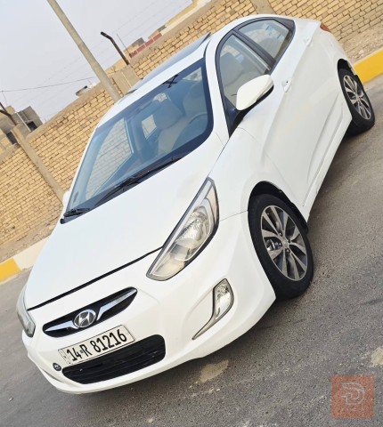 تويوتا هيونداي اكسنت 2015 لون عسلي للبيع في ذي قار