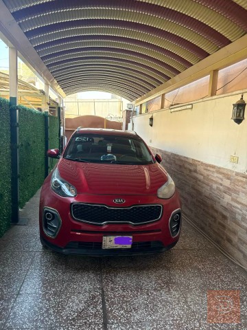 كيا سبورتج 2017 احمر للبيع في بغداد
