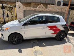 ميتسوبيشي ميراج رالي 2023 ابيض للبيع في بغداد