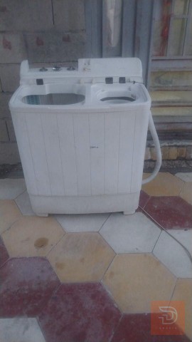 غسالة تجفف وتغسل للبيع في بغداد