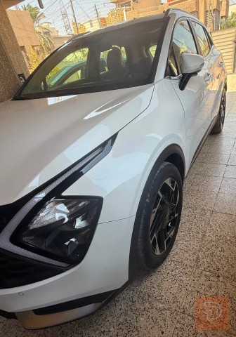 كيا سبورتج خليجي دفع رباعي ابيض ابيض صدفي للبيع في بغداد
