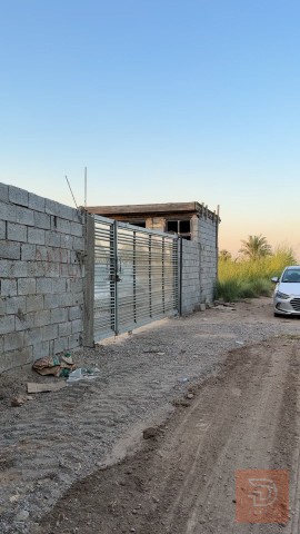 نص دونم أرض على شارعين للبيع في بغداد