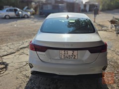 كيا K4 2025 لون سمنتي للبيع في بغداد