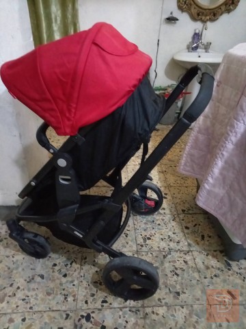 عربة أطفال رود ميت نظيفة أحمر وأسود للبيع في بغداد