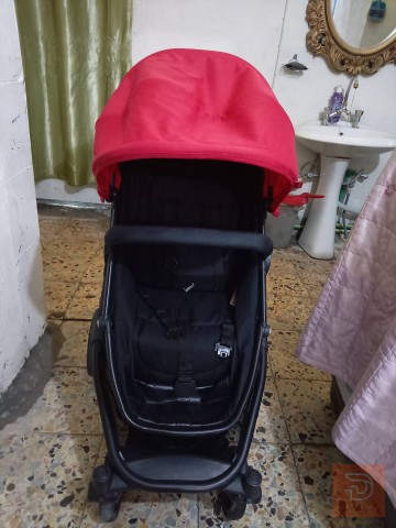 عربة أطفال رود ميت نظيفة أحمر وأسود للبيع في بغداد