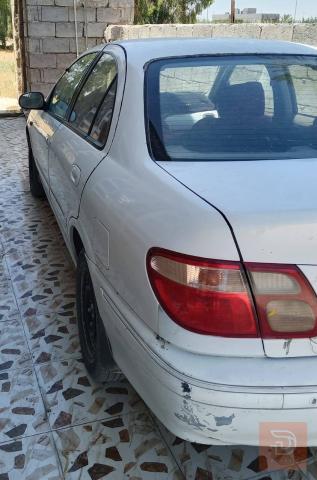 نيسان صني بيضاء موديل 2002 للبيع في الأنبار