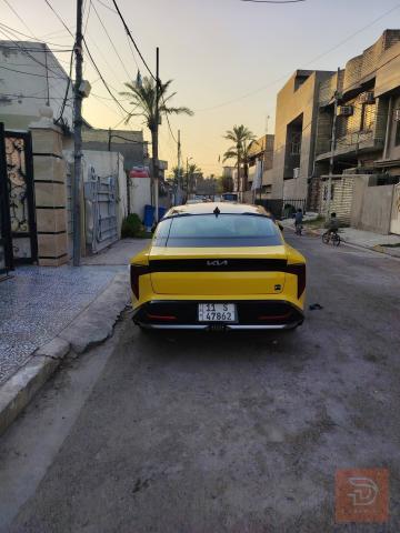 كيا كي فور 2025 لون اصفر ليموني للبيع في بغداد