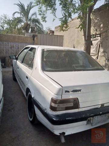 بيجو 405 مكينة وكير كورله مستعمل للبيع في ذي قار