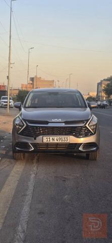 كيا سبورتج 2023 امريكي فضي للبيع في بغداد