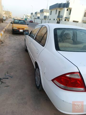 نيسان صني ٢٠٠٩ ابيض للبيع في بابل