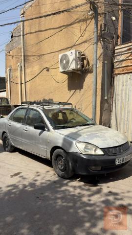 لانسر 2004 للبيع في بغداد