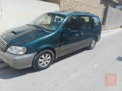 كيا سيدونا 2004 7 راكب للبيع في الديوانية