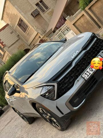 كيا سبورتج مواصفات كاملة لون اسمنتي 2024 للبيع في بغداد
