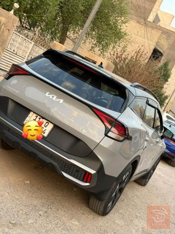 كيا سبورتج مواصفات كاملة لون اسمنتي 2024 للبيع في بغداد