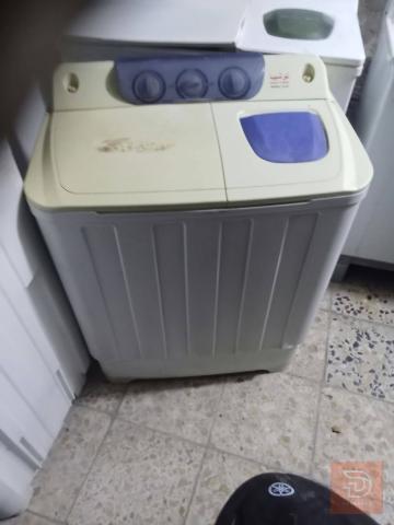 غسالات بأحجام مختلفة للبيع في بغداد