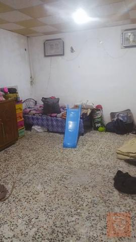 بيت تجاوز في حي صادق للبيع في البصرة