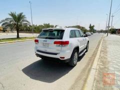 جيب لاريدو 2014 ابيض للمقايضة في واسط