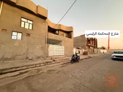 دار مع قطعة أرض في الورار للبيع في الأنبار