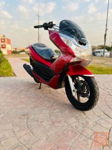 دراجة هوندا PCX جيل اول مستعمل للبيع في بغداد