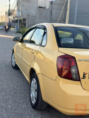 اوبترا 2011 كير اوتوماتيك للبيع في بغداد