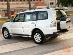 الشركة المعروفة ميتسوبيشي باجيرو 2009 ابيض للبيع في بغداد