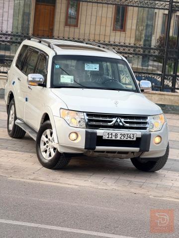 الشركة المعروفة ميتسوبيشي باجيرو 2009 ابيض للبيع في بغداد