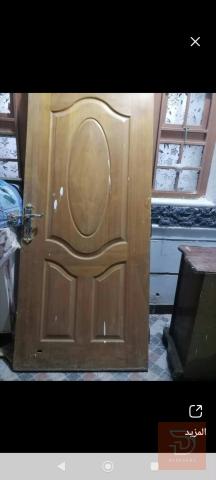 شباك حديد و 4 بيبان خشب جديد للبيع في واسط