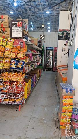 سوبر ماركت كامل مع معدات 100 متر مربع للبيع في كربلاء المقدسة