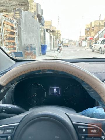 كيا سبورتج نوع حادثة طخة خفيفة مستعمل للبيع في بغداد