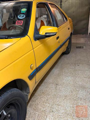 بيجو ٢٠١٥ بدون صبغ مستعمل للبيع في بغداد