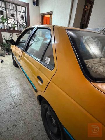 بيجو ٢٠١٥ بدون صبغ مستعمل للبيع في بغداد