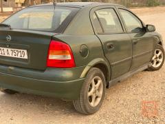 أوبل استرا 2002 نظيفة للبيع في بغداد