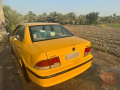 سيارة حمراء موديل 2011 للبيع في بغداد