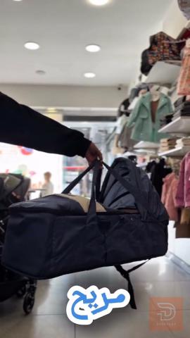 شنطة حمل مواليد من Chicco الأسود والرمادي الفاتح للبيع في الأنبار