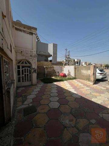 دار طابو صرف مساحة 210 متر للبيع في الديوانية