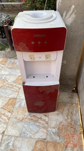براد حار وبارد مع خلل بالباب مستعمل للبيع في واسط