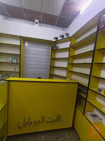 محل موبايلات كامل مع ملحقاته مستعمل للبيع في النجف الأشرف