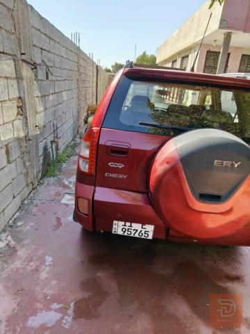 سيارة لون موروني مستعمل للبيع في بغداد