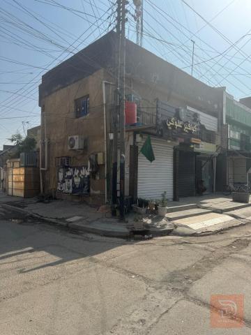 بناية ركن 100 متر في الدورة للبيع في بغداد